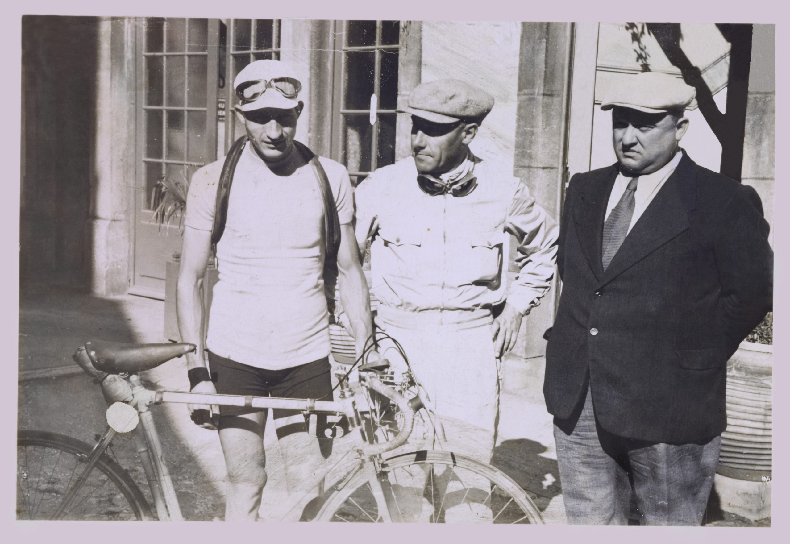 Gino Bartali, winner of the 1938 Tour de France on a Legnano-Pirelli bicycle; beside him is Costante Girardengo, then coach of the Italian national team competing in the Tour